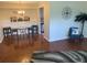 Inviting dining area with a decorative wall and a view into the kitchen at 2690 Coral Landings Blvd # 722, Palm Harbor, FL 34684