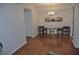 Well-lit dining area with a view of the closet and decorative lighting at 2690 Coral Landings Blvd # 722, Palm Harbor, FL 34684