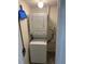 Small laundry room area with a stackable washer and dryer unit at 2690 Coral Landings Blvd # 722, Palm Harbor, FL 34684