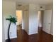 Spacious living room leading to a bathroom and other rooms at 2690 Coral Landings Blvd # 722, Palm Harbor, FL 34684