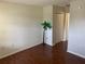 Living room with wood floors, featuring a tropical-themed decoration at 2690 Coral Landings Blvd # 722, Palm Harbor, FL 34684