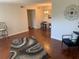 Inviting living room showcasing hardwood floors and a neutral color scheme at 2690 Coral Landings Blvd # 722, Palm Harbor, FL 34684