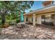 Charming patio with dining area, perfect for outdoor gatherings and enjoying the serene surroundings at 2690 Coral Landings Blvd # 722, Palm Harbor, FL 34684