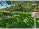 Bench in the Meadowlake pet park, offering a serene space for residents and their companions at 2690 Coral Landings Blvd # 722, Palm Harbor, FL 34684