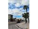 Residential street scene with palm trees and buildings at 113 Boca Ciega Dr, Madeira Beach, FL 33708