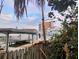 Boats docked at a pier with a partially obscured view at 113 Boca Ciega Dr, Madeira Beach, FL 33708