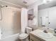 Clean bathroom with tub, sink, and mirror at 3713 Champagne Dr # 115, Tampa, FL 33618