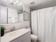 Clean bathroom, featuring a shower/tub combo and updated vanity at 3713 Champagne Dr # 115, Tampa, FL 33618