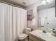 Clean bathroom with shower/tub combo, vanity, and mirror at 3713 Champagne Dr # 115, Tampa, FL 33618