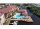 Aerial view of community pool, dock, and boat slips at 5000 Culbreath Key Way # 1-203, Tampa, FL 33611