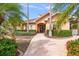 Community building entrance with landscaped walkway at 5000 Culbreath Key Way # 1-203, Tampa, FL 33611