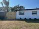 Backyard featuring a wooden fence surrounding the property at 9322 88Th Way, Seminole, FL 33777