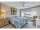 Spacious bedroom with king bed and water view at 4650 Cove Cir # 304, St Petersburg, FL 33708