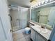 Clean bathroom with shower/tub combo and vanity at 1308 Pine Ridge E Cir # E3, Tarpon Springs, FL 34688