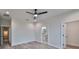 Bright bedroom with ceiling fan, hardwood floors and access to a full bathroom at 1906 Cherry W St # 1, Tampa, FL 33607