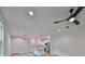 Modern kitchen with recessed lighting, white cabinets, and a ceiling fan at 1906 Cherry W St # 1, Tampa, FL 33607