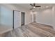 Spacious bedroom with wood-look floors and a ceiling fan at 1906 Cherry W St # 2, Tampa, FL 33607