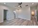 Spacious bedroom with hardwood floors and en-suite bathroom access at 1906 Cherry W St # 2, Tampa, FL 33607