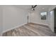 Spacious bedroom with wood-look floors and a ceiling fan at 1906 Cherry W St # 2, Tampa, FL 33607