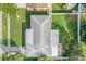 Aerial view of a single-story house with a large backyard and patio at 2315 Nash St, Clearwater, FL 33765