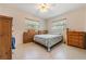 Bright bedroom with a double bed and wood dresser at 2315 Nash St, Clearwater, FL 33765