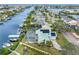 Aerial view of waterfront homes on a canal and the Gulf of Mexico in the distance at 1104 Kingfish Pl, Apollo Beach, FL 33572