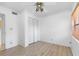 Minimalist bedroom featuring a ceiling fan and closet at 1104 Kingfish Pl, Apollo Beach, FL 33572