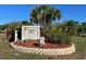 Welcome to Dolphin Cove! A beautiful community entrance with lush landscaping and a friendly neighborhood atmosphere at 1104 Kingfish Pl, Apollo Beach, FL 33572