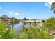 Waterfront dock with a boat house at 1104 Kingfish Pl, Apollo Beach, FL 33572