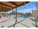 Covered pool area with a slide and views of the water at 1104 Kingfish Pl, Apollo Beach, FL 33572