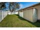 Private backyard with grassy area and shed at 11933 72Nd Ave, Seminole, FL 33772