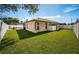 Fenced-in backyard with mature trees at 11933 72Nd Ave, Seminole, FL 33772