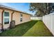 Fenced backyard with grassy area at 11933 72Nd Ave, Seminole, FL 33772