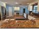 Modern kitchen with white cabinets and granite countertops at 11933 72Nd Ave, Seminole, FL 33772