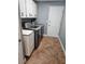 Laundry room with washer, dryer, and cabinets at 11933 72Nd Ave, Seminole, FL 33772