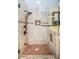 Updated shower with tiled walls and a glass enclosure at 11933 72Nd Ave, Seminole, FL 33772