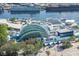 View of Florida Aquarium with glass dome, solar panels, with ocean freighter in the background at 1209 E Cumberland Ave # 508, Tampa, FL 33602