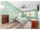 Spacious bedroom with wood floors and ceiling fan at 270 Pinewinds Blvd, Oldsmar, FL 34677