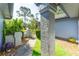 Pathway leading to the backyard through a gate at 270 Pinewinds Blvd, Oldsmar, FL 34677