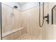 Large walk-in shower with tile surround and bench at 270 Pinewinds Blvd, Oldsmar, FL 34677