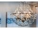 Elegant chandelier with crystal accents at 30200 Southernwood Ct, Wesley Chapel, FL 33543