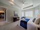 Bright main bedroom with a view of the kitchen and access to it at 30200 Southernwood Ct, Wesley Chapel, FL 33543