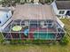 Aerial view showing a home with a screened pool and patio at 5512 47Th E Ct, Bradenton, FL 34203