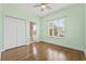 Main bedroom with hardwood floors and en-suite bathroom at 605 Casabella Cir, Tampa, FL 33609