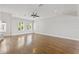 Bright living room with hardwood floors and ceiling fan at 605 Casabella Cir, Tampa, FL 33609