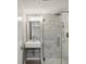 Modern bathroom with a glass shower and marble tile at 1524 Lakeview Rd # 103, Clearwater, FL 33756