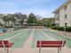 Community shuffleboard courts with red benches at 1524 Lakeview Rd # 103, Clearwater, FL 33756