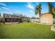 Large backyard with a shed, pool, and fire pit at 809 41St N Ave, St Petersburg, FL 33703