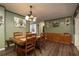 Dining room features wood table and chairs, and built-in hutch at 809 41St N Ave, St Petersburg, FL 33703