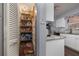 Well-stocked pantry with ample shelving for storage at 809 41St N Ave, St Petersburg, FL 33703